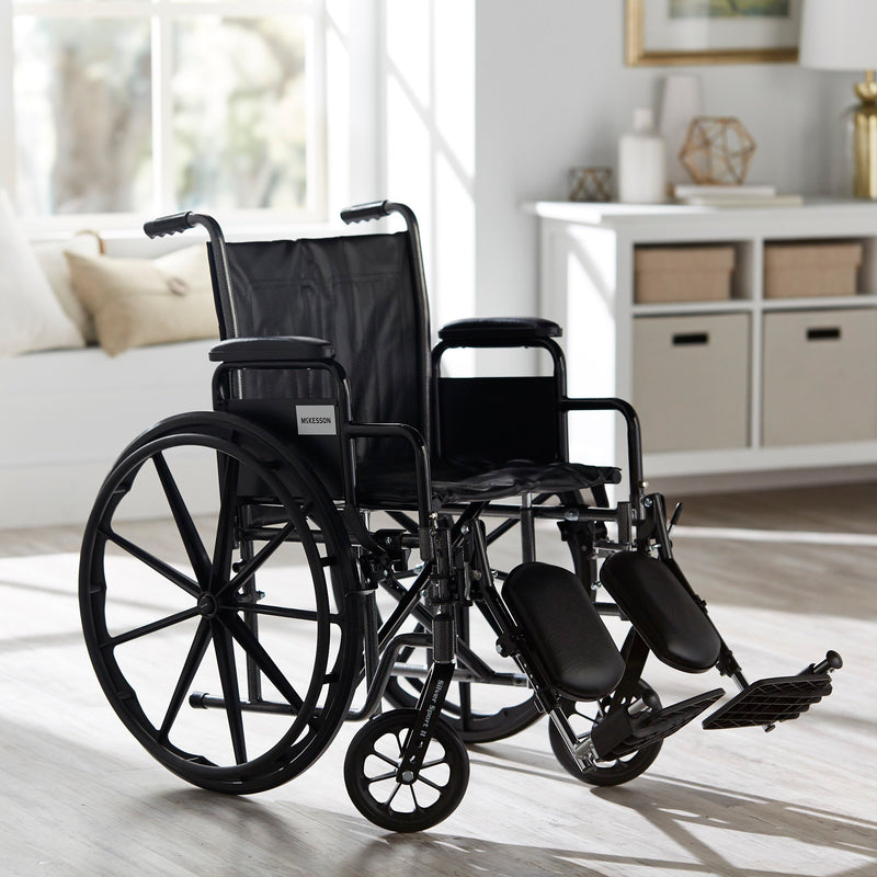 McKesson Wheelchair Dual Axle Desk Length Arm Swing-Away Elevating Legrest Black Upholstery 18 Inch Seat Width Adult 300 lbs. Weight Capacity (1065277_EA) 1/EA