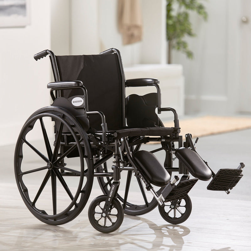 McKesson Lightweight Wheelchair Dual Axle Desk Length Arm Swing-Away Elevating Legrest Black Upholstery 20 Inch Seat Width Adult 300 lbs. Weight Capacity (1065287_EA) 1/EA