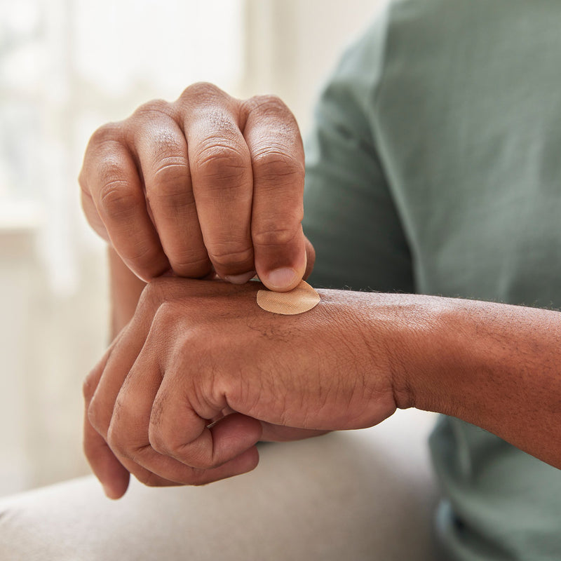 McKesson Adhesive Spot Bandage 1 Inch Fabric Round Tan Sterile (466870_CS) 2400/CS