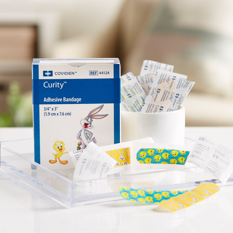 Curity™ Adhesive Strip 3/4 X 3 Inch Plastic Rectangle Kid Design (Assorted Looney Tunes) Sterile (867805_BX) 1/BX