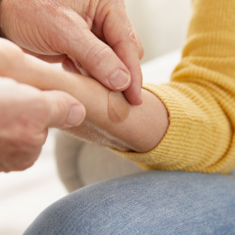 McKesson Adhesive Spot Bandage 1 Inch Fabric Round Tan Sterile (466870_CS) 2400/CS