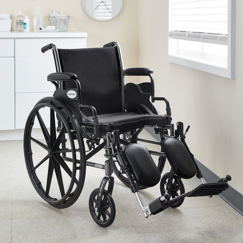 McKesson Wheelchair Dual Axle Desk Length Arm Swing-Away Footrest Black Upholstery 20 Inch Seat Width Adult 350 lbs. Weight Capacity (1065278_EA) 1/EA