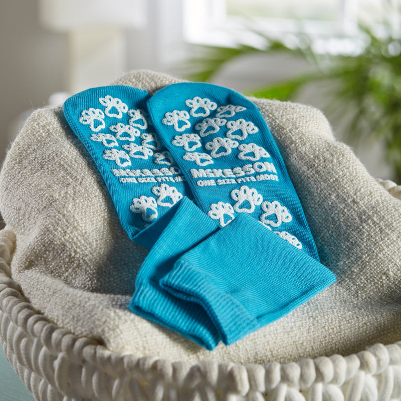 McKesson Paw Prints® Slipper Socks Unisex Adult One Size Fits Most Single Tread Single Patient Use Teal (475019_CS) 96/CS